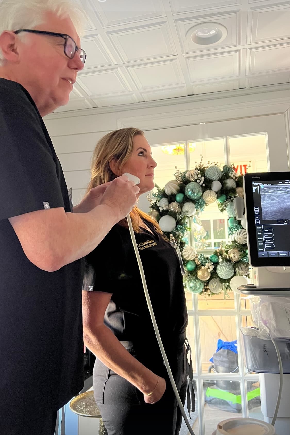 Dawn Naylor participating in hands-on facial ultrasound education